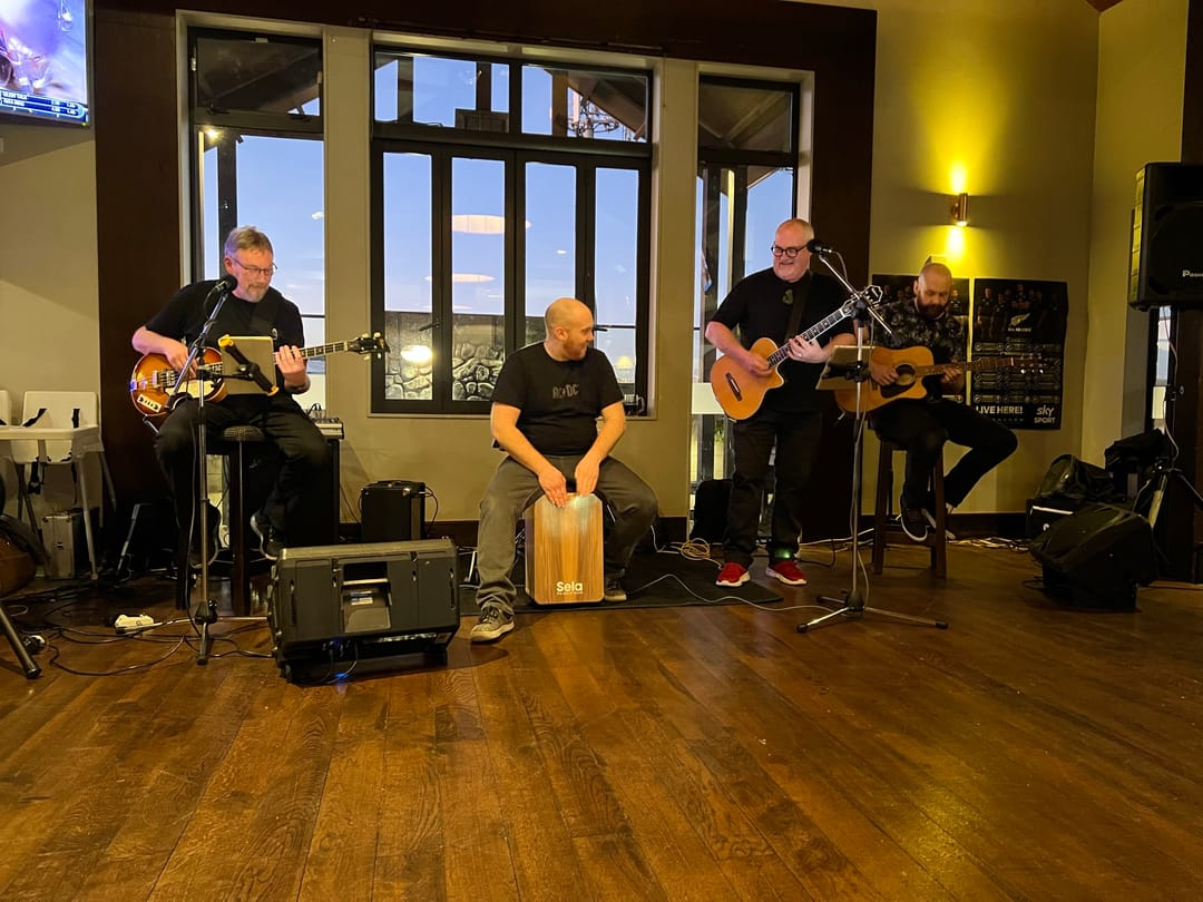 Night Cru acoustic setup for a smaller Southland corporate event